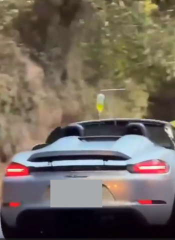 敞篷保時捷掛點滴上路引發討論　醫界示警恐影響行車安全